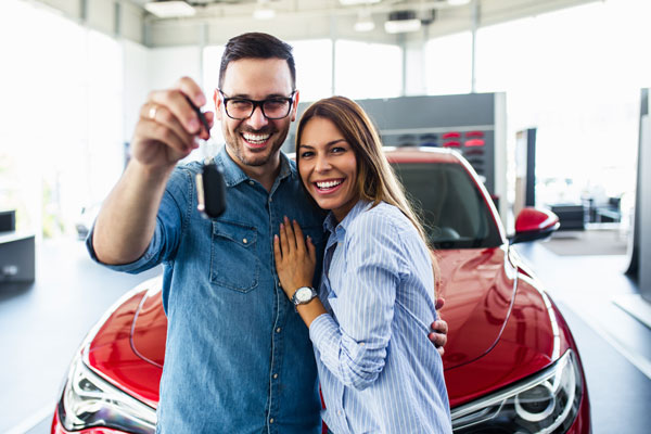 Couple with car keys