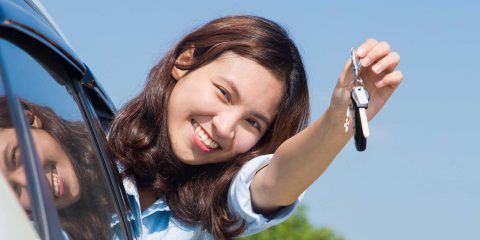 Girl holding keys